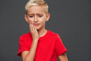 child with toothache